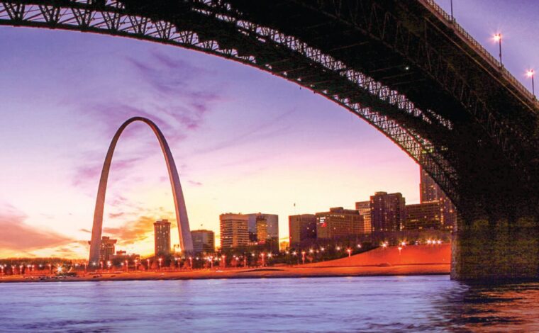 The Eads bridge borders the top of the image with the Gateway Arch in the back ground.